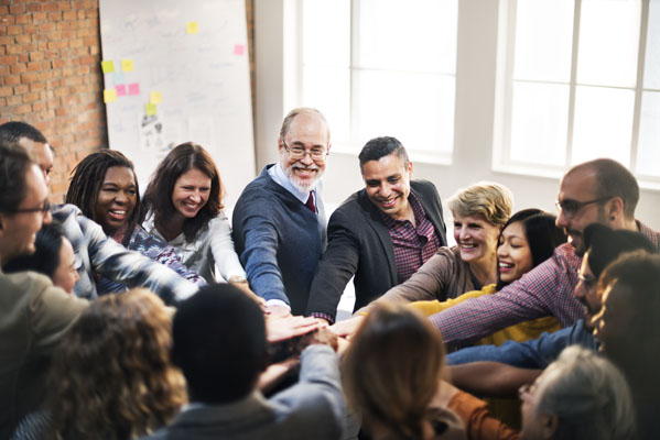 Photo of people working together